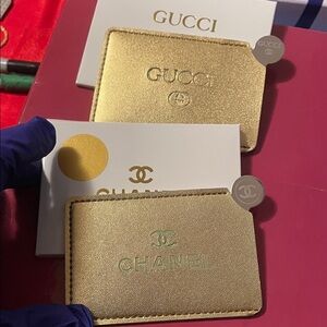 Gucci and Chanel Gold mirrors
